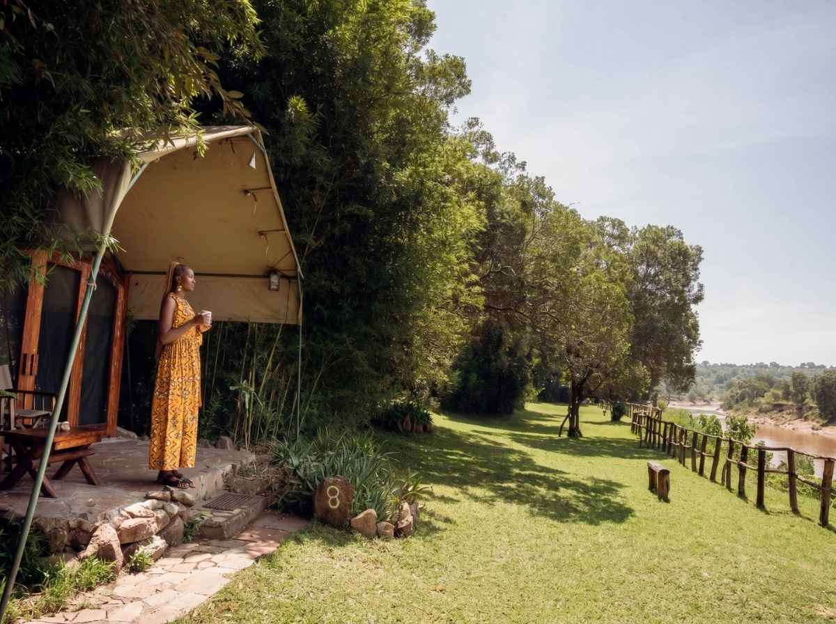 Canvas River Tent interior with private terrace overlooking the Mara River, Exploreans Mara River Camp Kenya